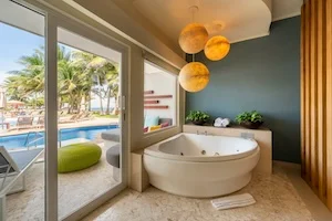 https://www.palmarbeachresortandspa.com/galleries/Suites/PREMIUM CORNER SUITE SWIM UP TERRACE.webp